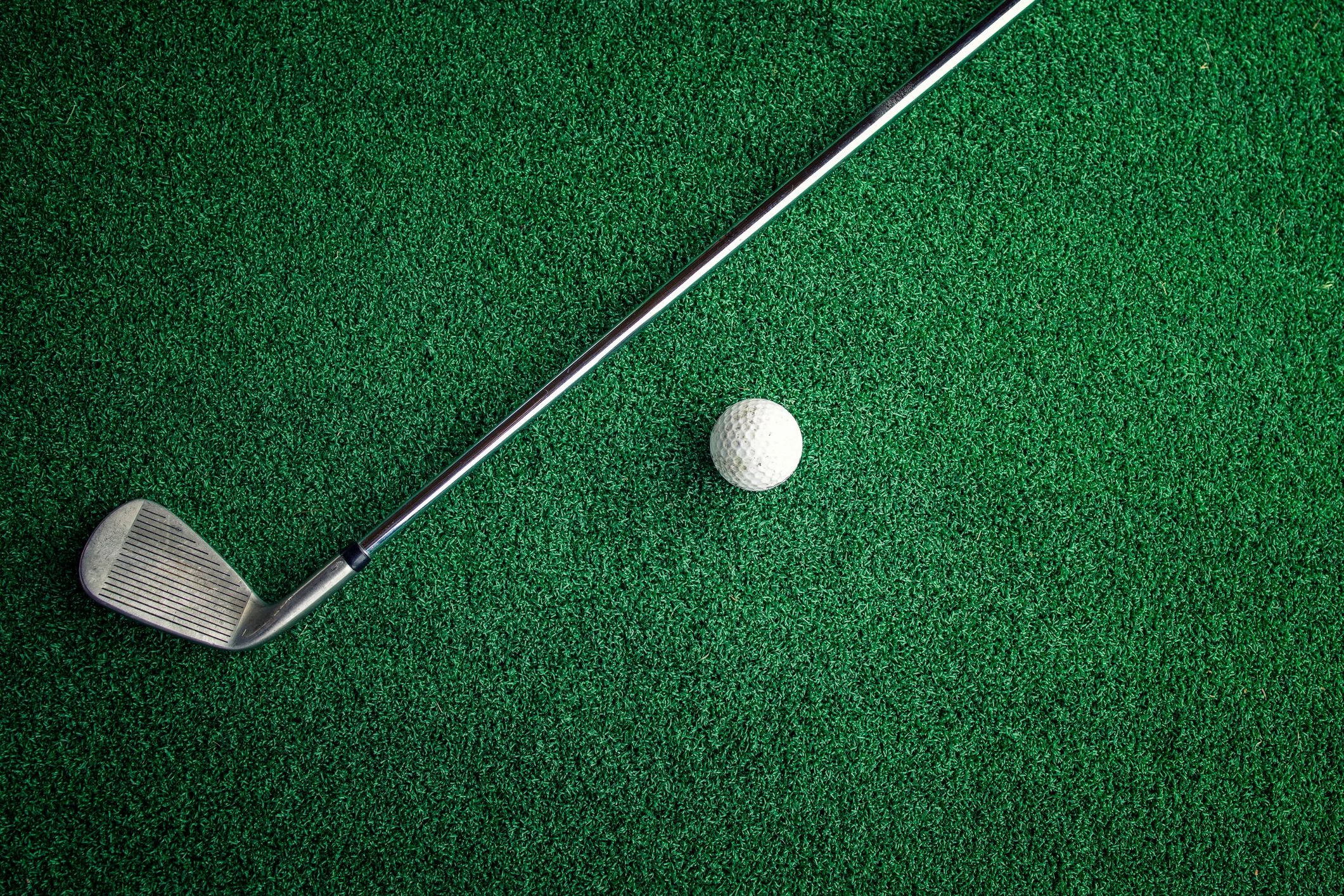 Golf club and ball ready for focused practice